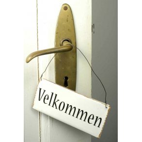 Metal skilt. Velkommen.