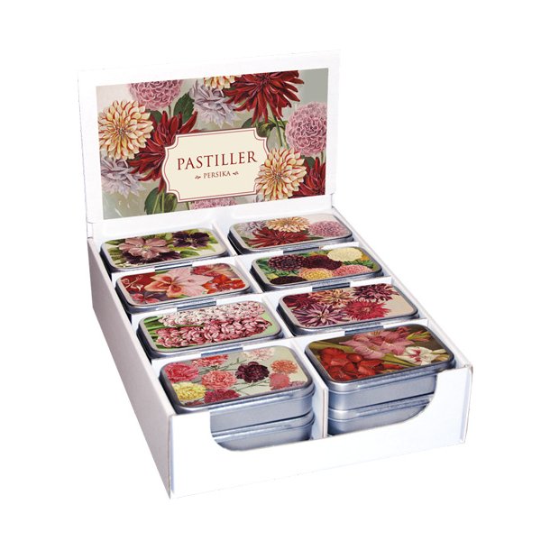 ske med pastiller. Mrke blomster. ferskensmag