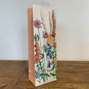 Gavepose med blomster og glimmer