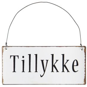 Metal skilt. Tillykke.